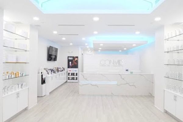 Clean, professional medical spa treatment room with neutral tones at Icon MD Medical Spa + Laser Center Waltham in Brookline