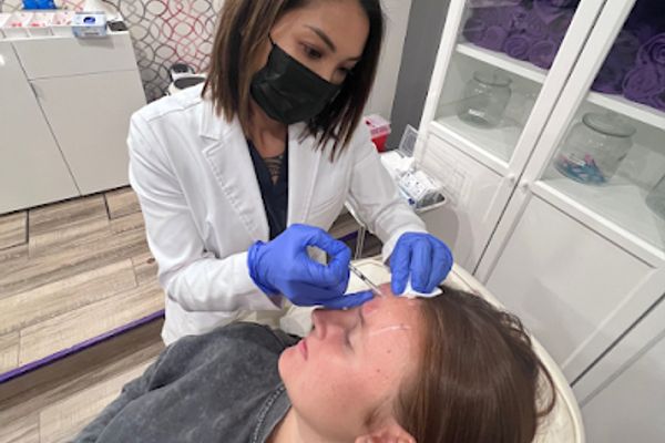 Clean, professional medical spa treatment room with neutral tones at Medspa of Austin in Austin