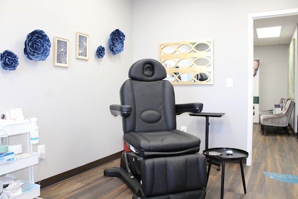 Clean, professional medical spa treatment room with neutral tones at Tala Medical Aesthetics in Alexandria